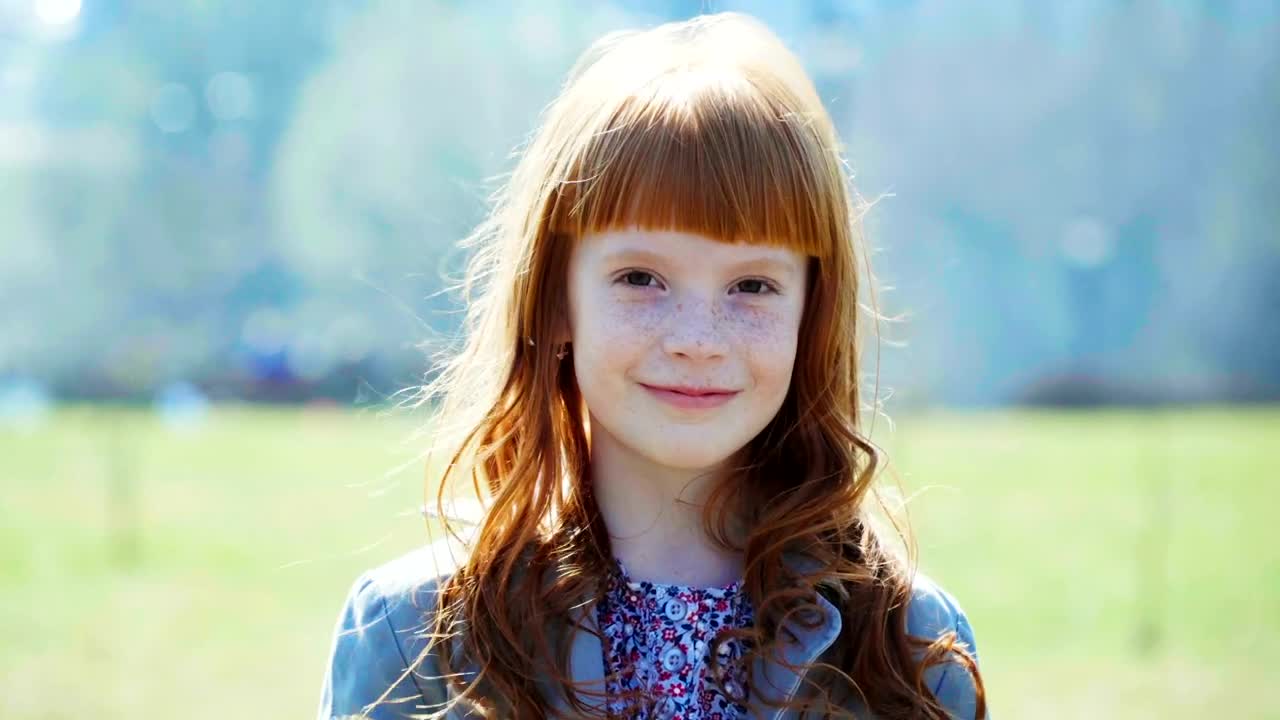 Stock Video Happy Girl Smiling Outside Animated Wallpaper