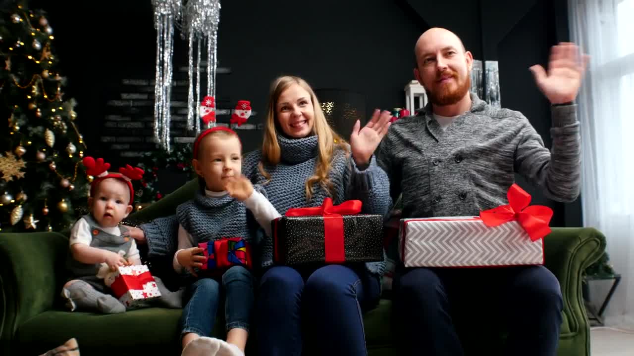 Stock Video Happy Family With Christmas Gifts At Home Animated Wallpaper