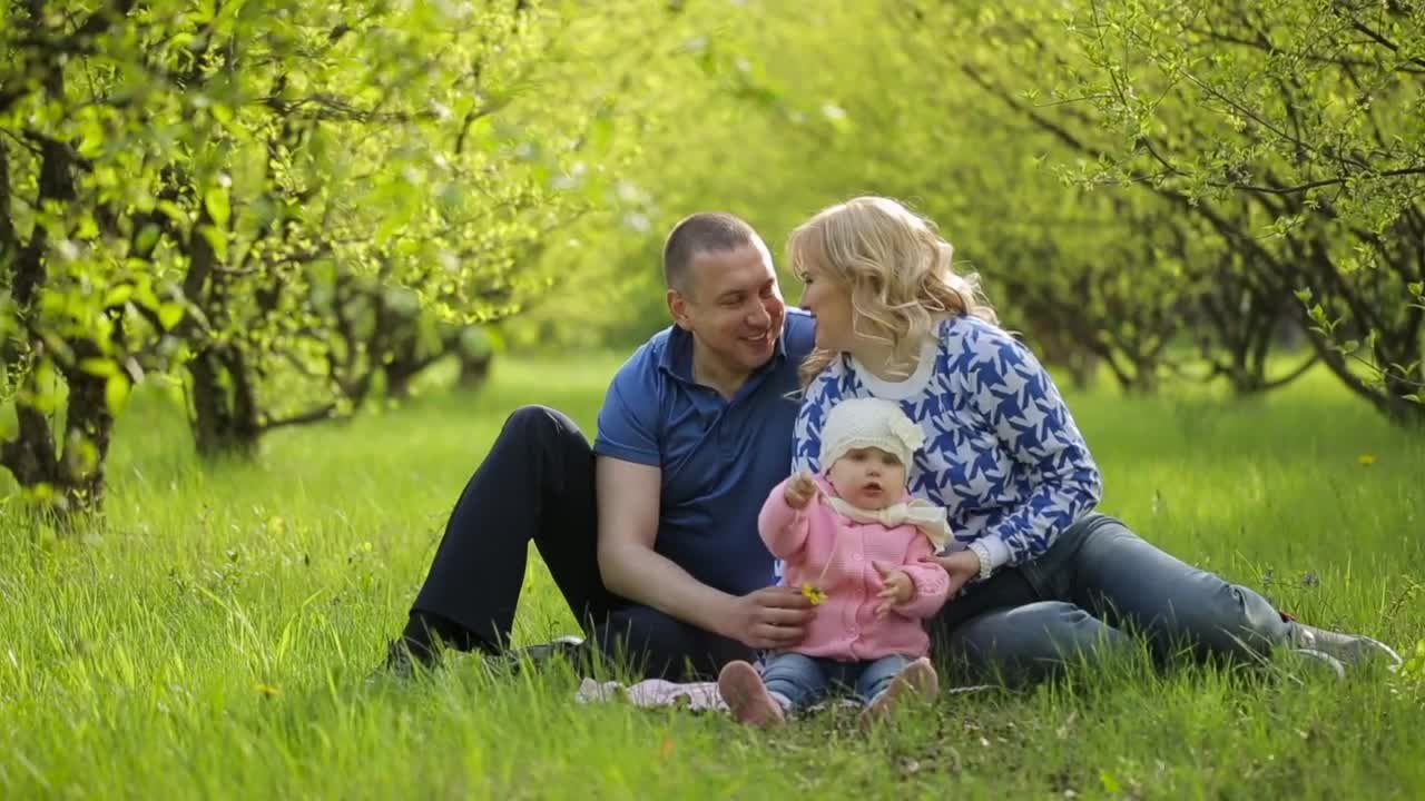 Stock Video Happy Family Spending Time Together In The Park Animated Wallpaper