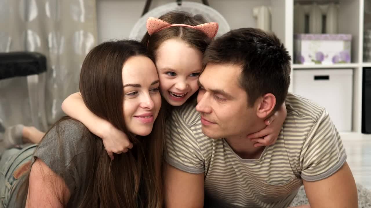 Stock Video Happy Family Smiling For The Camera Animated Wallpaper
