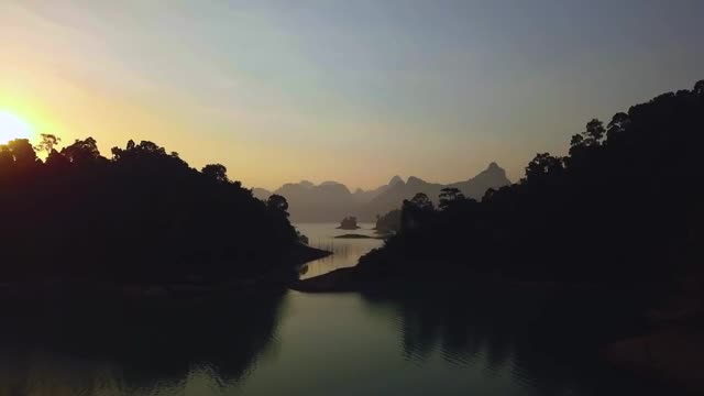 Stock Video Landscape Of A Large Lake During Sunset From The Air Smal Animated Wallpaper