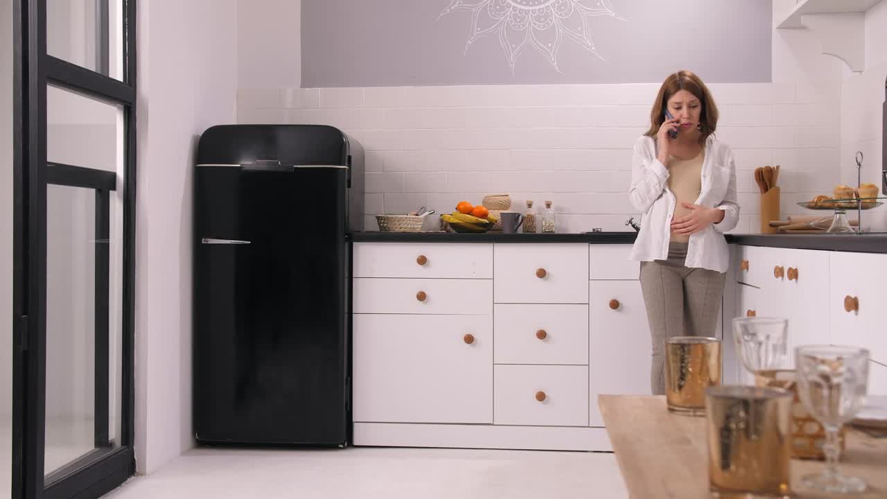 Stock Video Man Giving His Pregnant Wife A Gift Animated Wallpaper