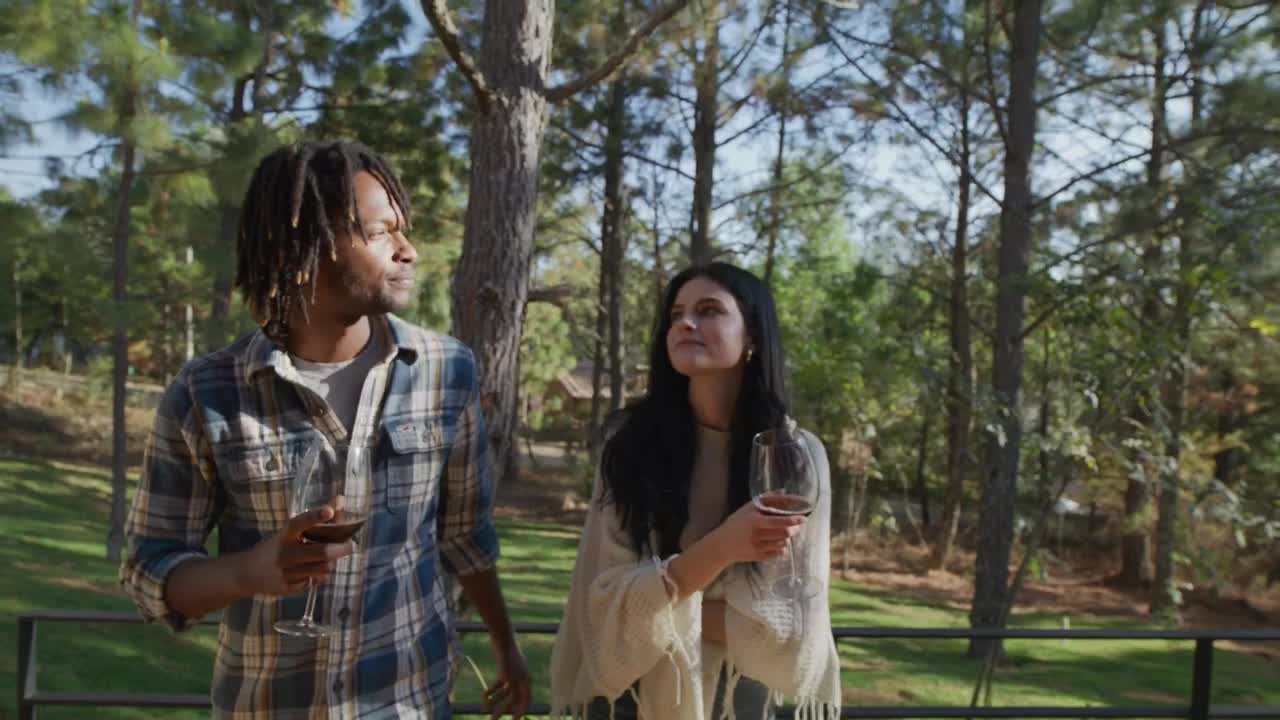 Stock Video Man And Woman Walking Through A Park Animated Wallpaper