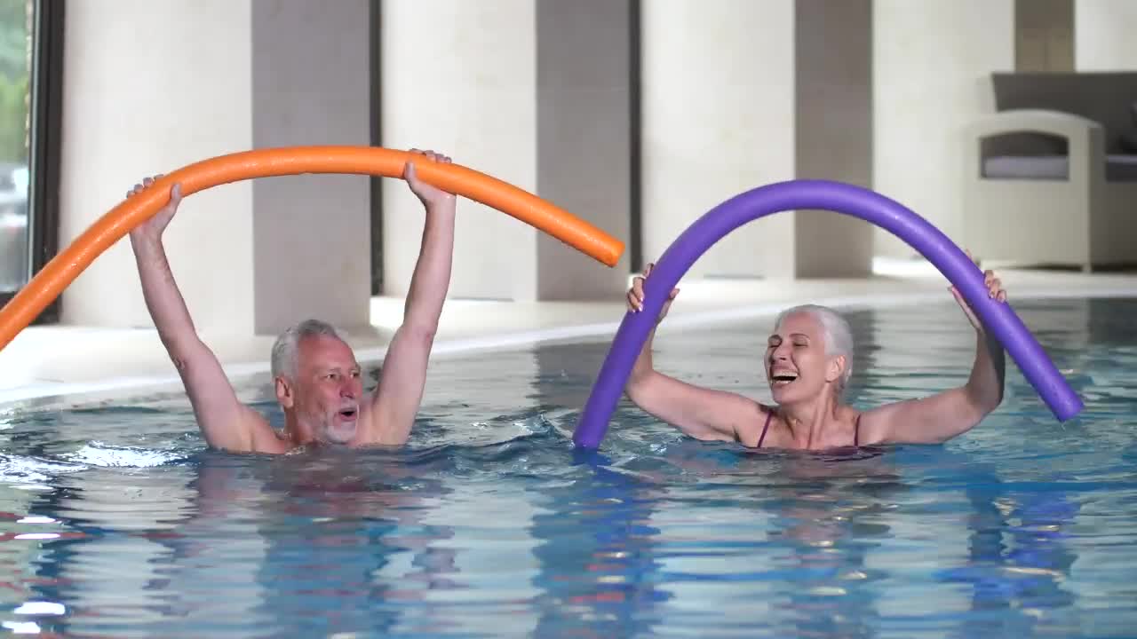 Stock Video Man And Woman Swimming Together Animated Wallpaper