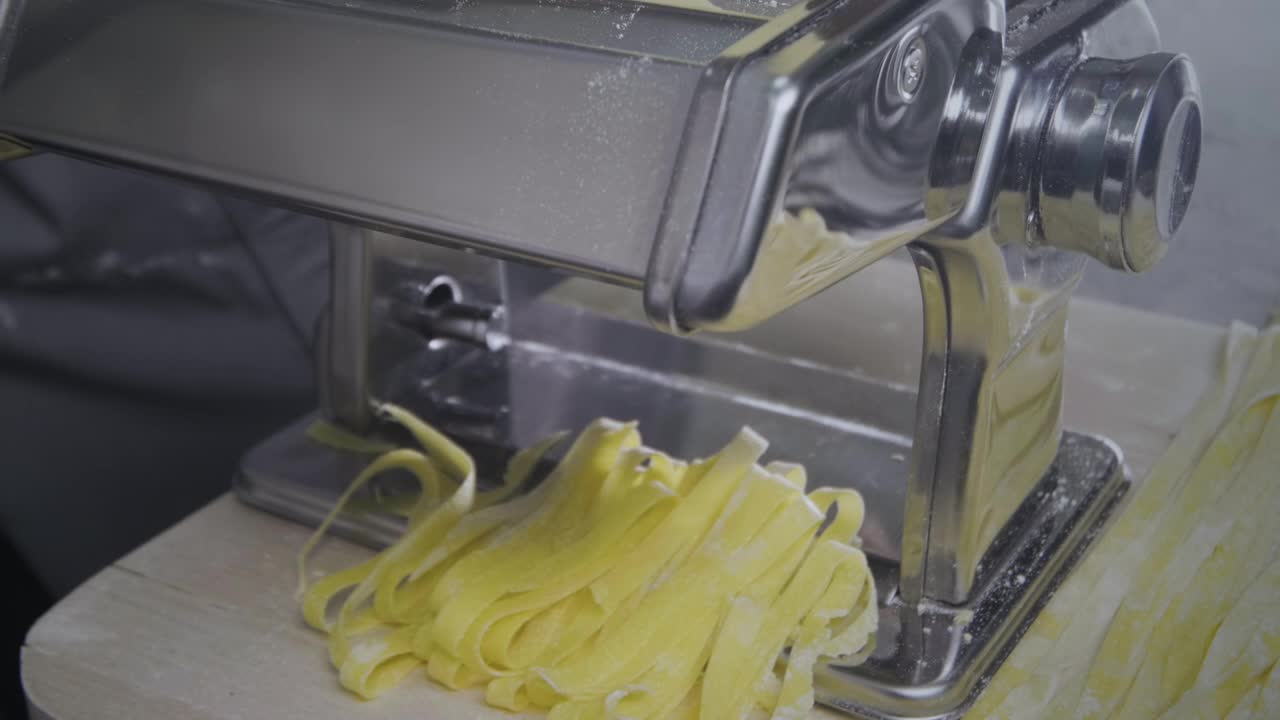 Stock Video Making Pasta With Professional Equipment Animated Wallpaper