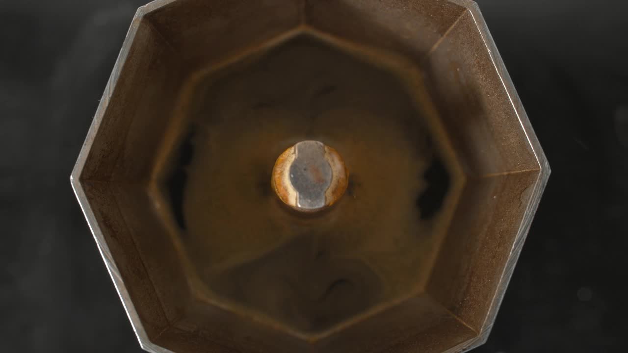 Stock Video Making Coffee In A Moka Pot Animated Wallpaper