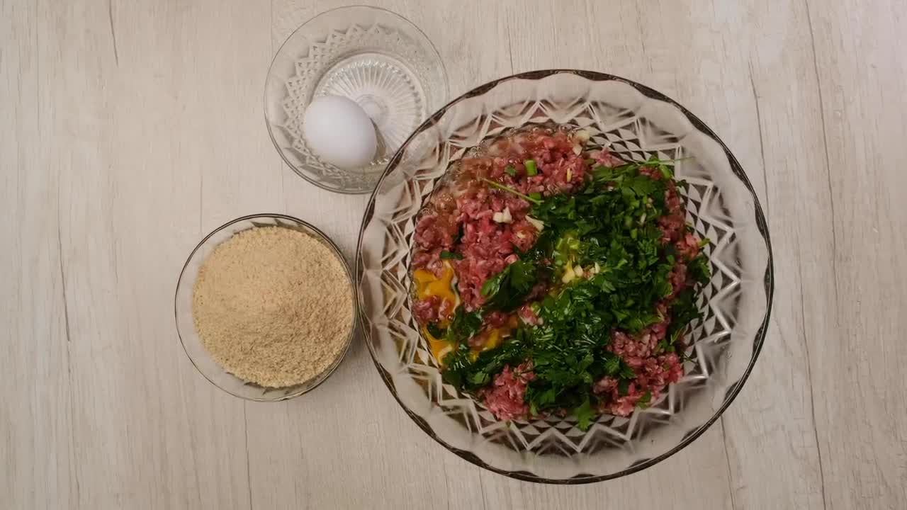Stock Video Making Breaded Meat Animated Wallpaper