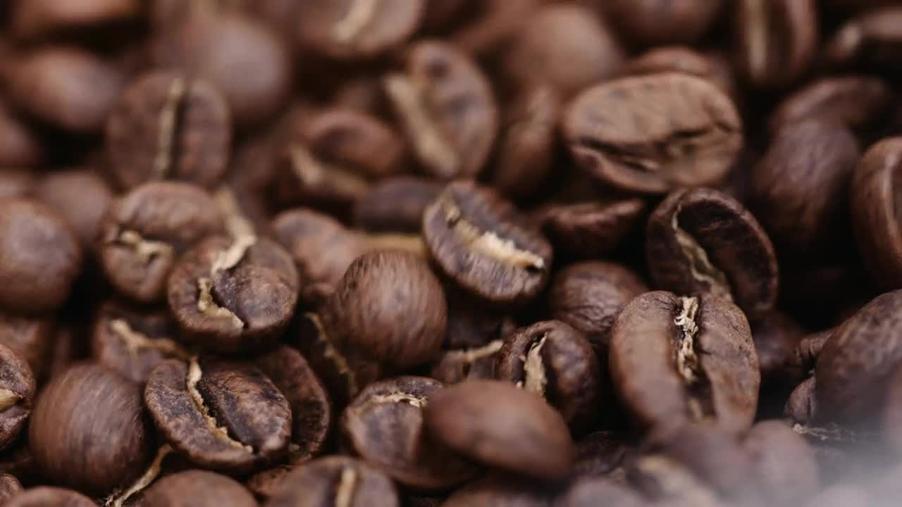 Stock Video Macro Shot Of Roasted Coffee Beans Moving Animated Wallpaper