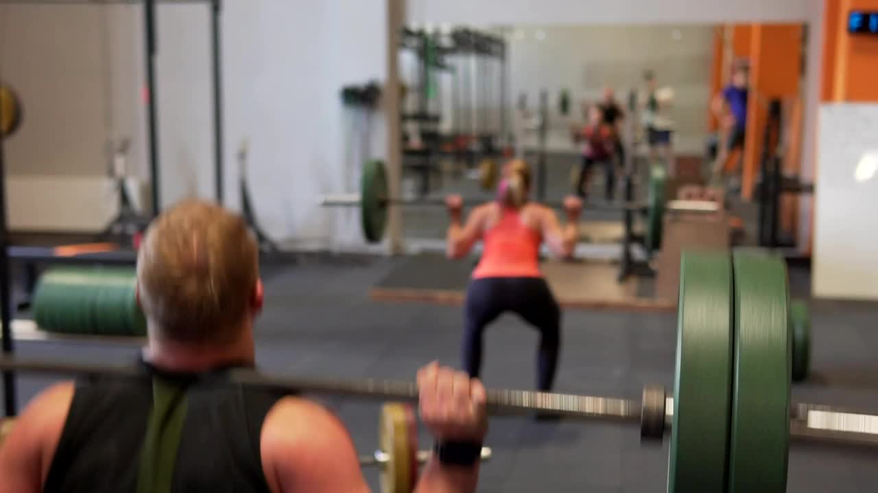 Stock Video Lifting Weights In The Gym Animated Wallpaper