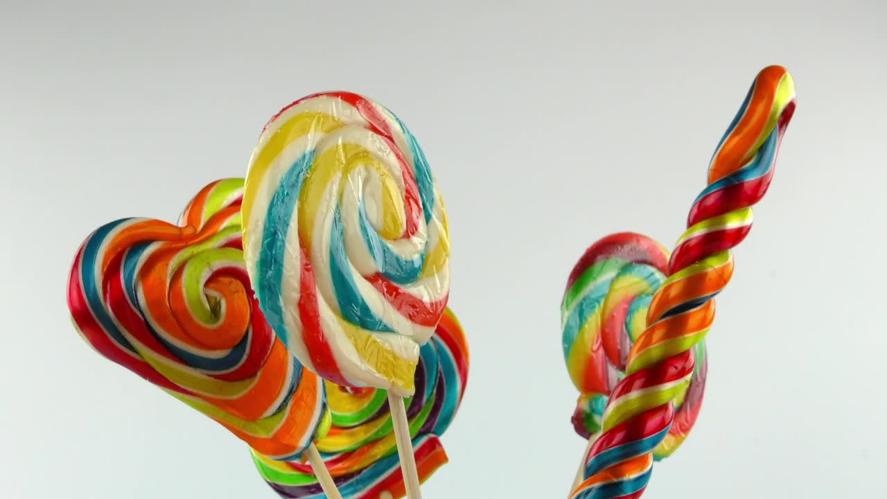Stock Video Large Rainbow Swirl Lollipops Animated Wallpaper