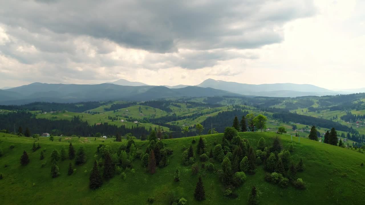 Stock Video Large Expanse Of Green Field Near A Village Animated Wallpaper