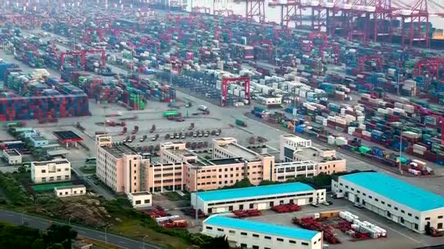 Stock Video Large Container Area On A Coastline Aerial Shot Smal Animated Wallpaper