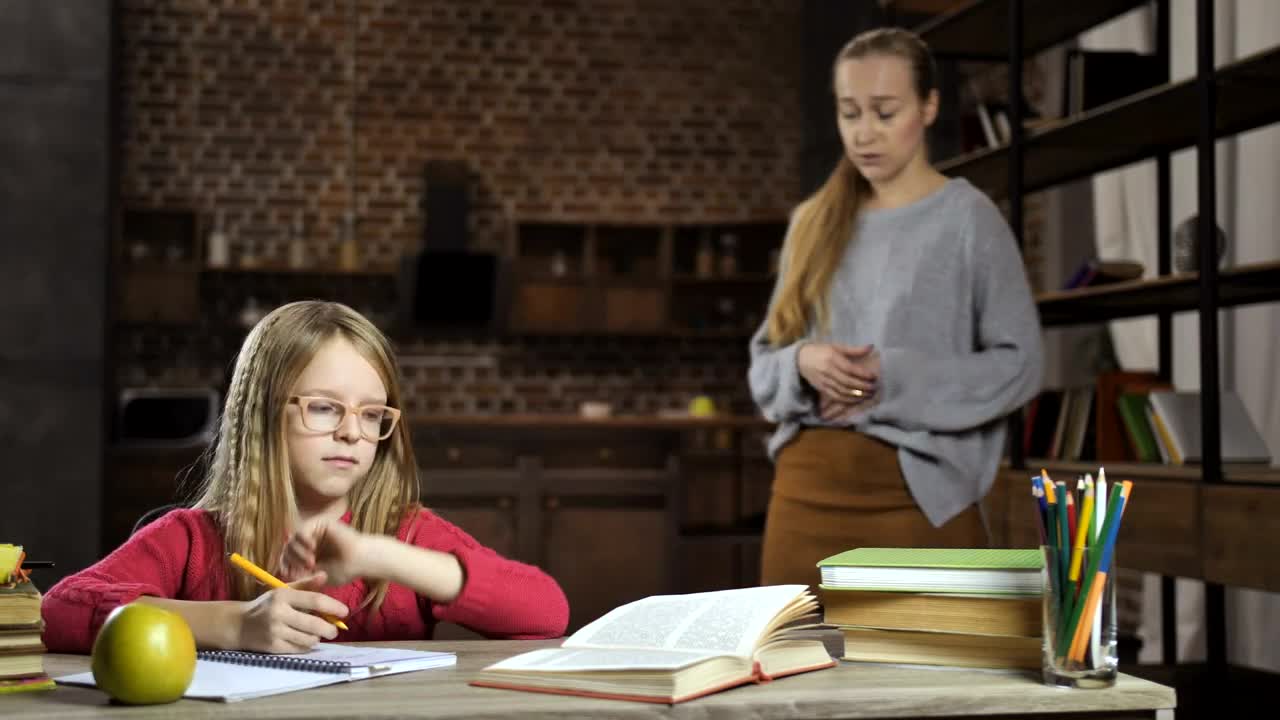 Stock Video Mother Talking To Her Daughter About Schoo Animated Wallpaper