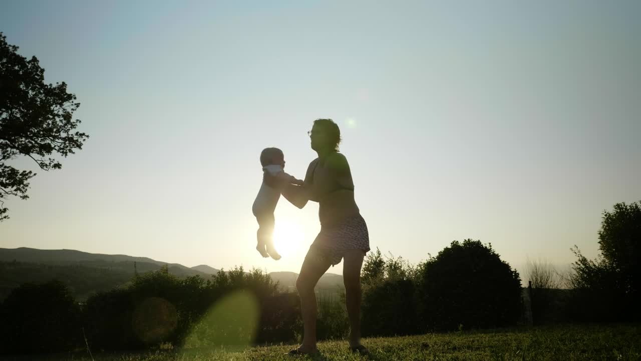 Stock Video Mother Spinning Her Bab Animated Wallpaper