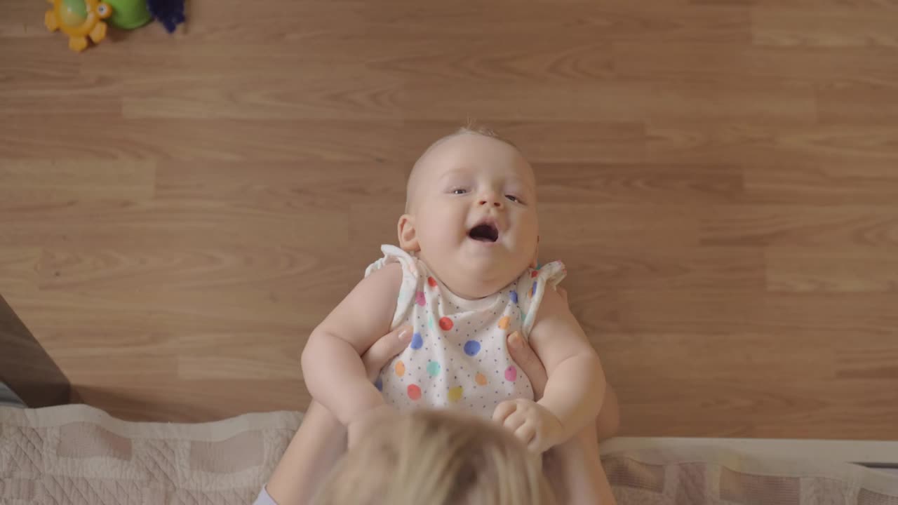 Stock Video Mother Making Her Baby Laug Animated Wallpaper