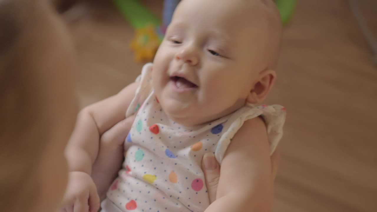 Stock Video Mother Making Her Baby Smil Animated Wallpaper