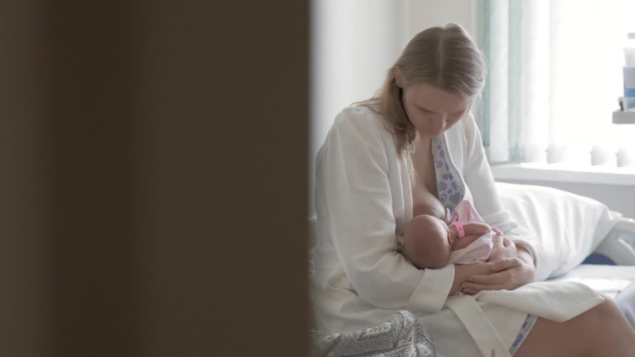 Stock Video Mother Breastfeeding Her Newbor Animated Wallpaper