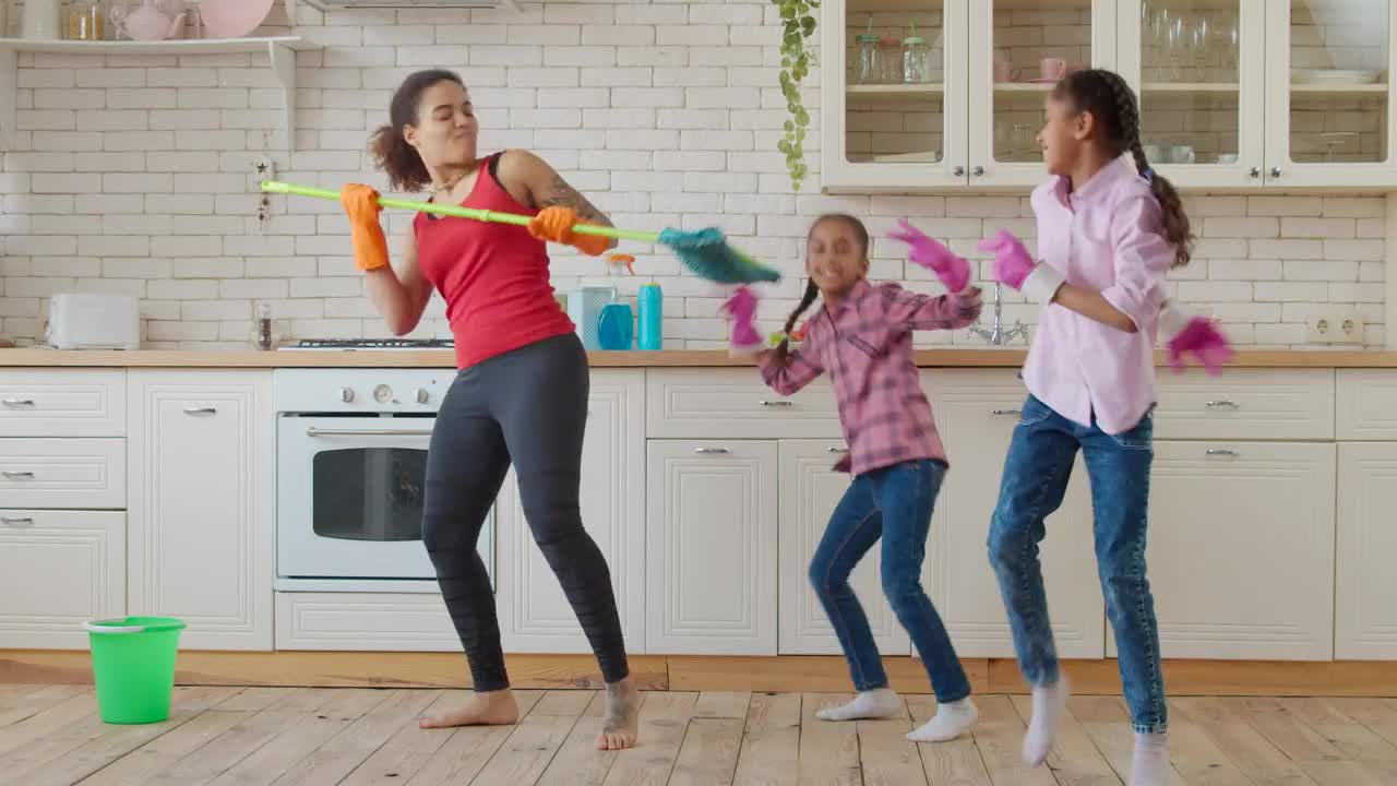 Stock Video Mother And Daughters In A Kitchen Dancin Animated Wallpaper