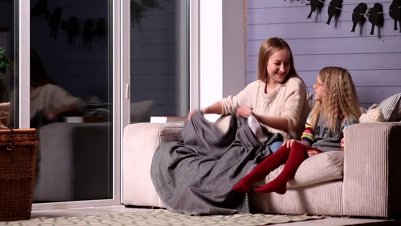 Stock Video Mother And Daughter With A Blanke Animated Wallpaper