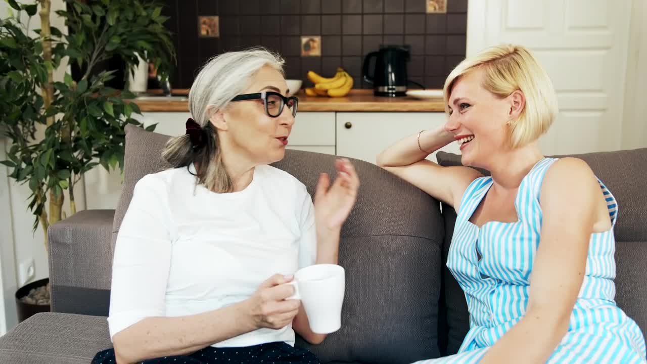 Stock Video Mother And Daughter Talking In Their Living Roo Animated Wallpaper
