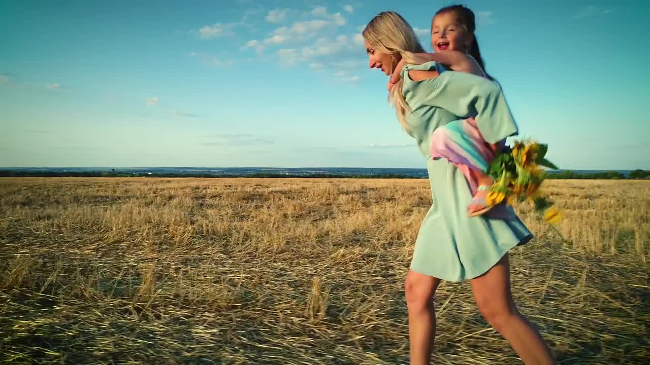 Stock Video Mother And Daughter Taking A Walk In The Fiel Animated Wallpaper