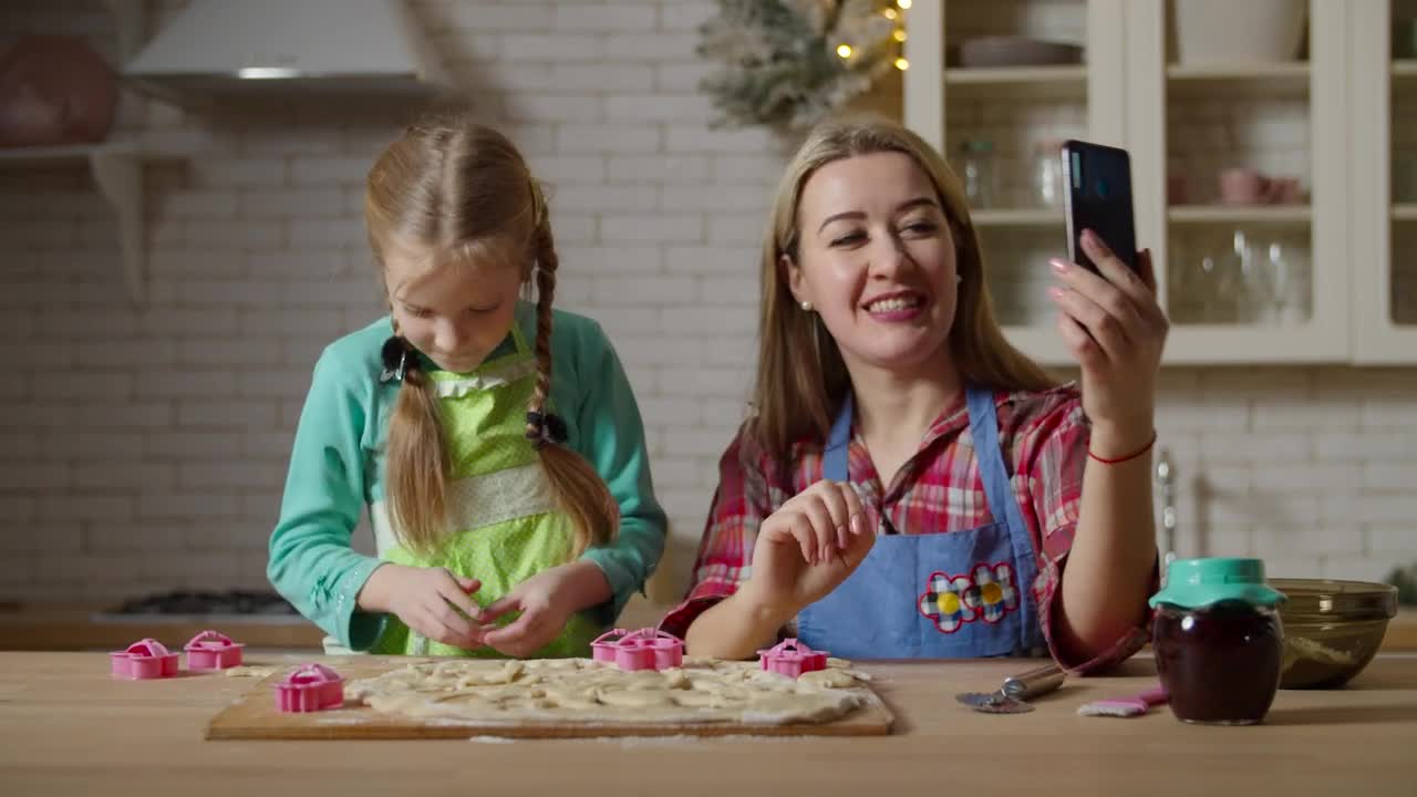 Stock Video Mother And Daughter Making Cookies In The Kitche Animated Wallpaper