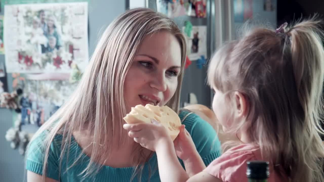 Stock Video Mother And Daughter Hug In The Kitche Animated Wallpaper