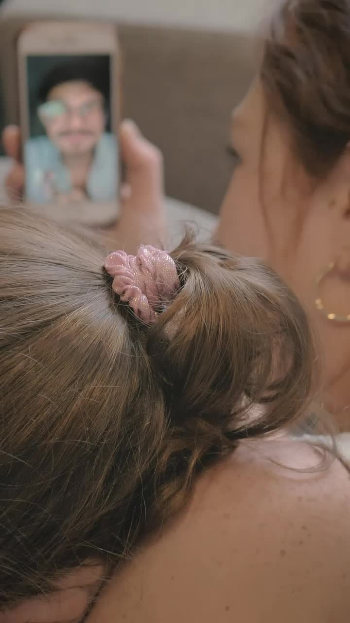 Stock Video Mother And Daughter Having A Video Cal Animated Wallpaper