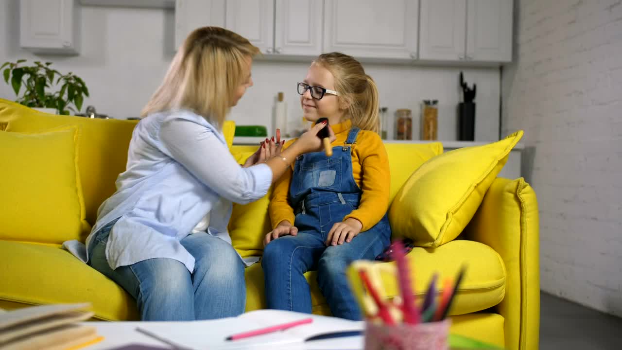 Stock Video Mother And Daughter Applying Makeu Animated Wallpaper