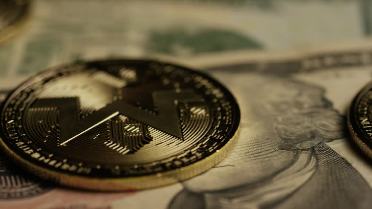 Stock Video Monero Coins Ober Dollar Bill Animated Wallpaper