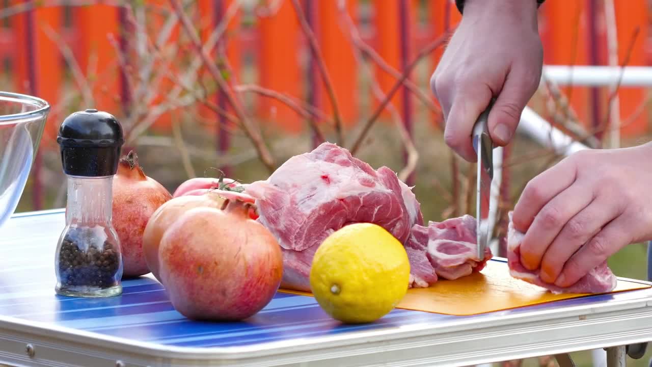 Stock Video Men Slicing Meat For Bb Animated Wallpaper
