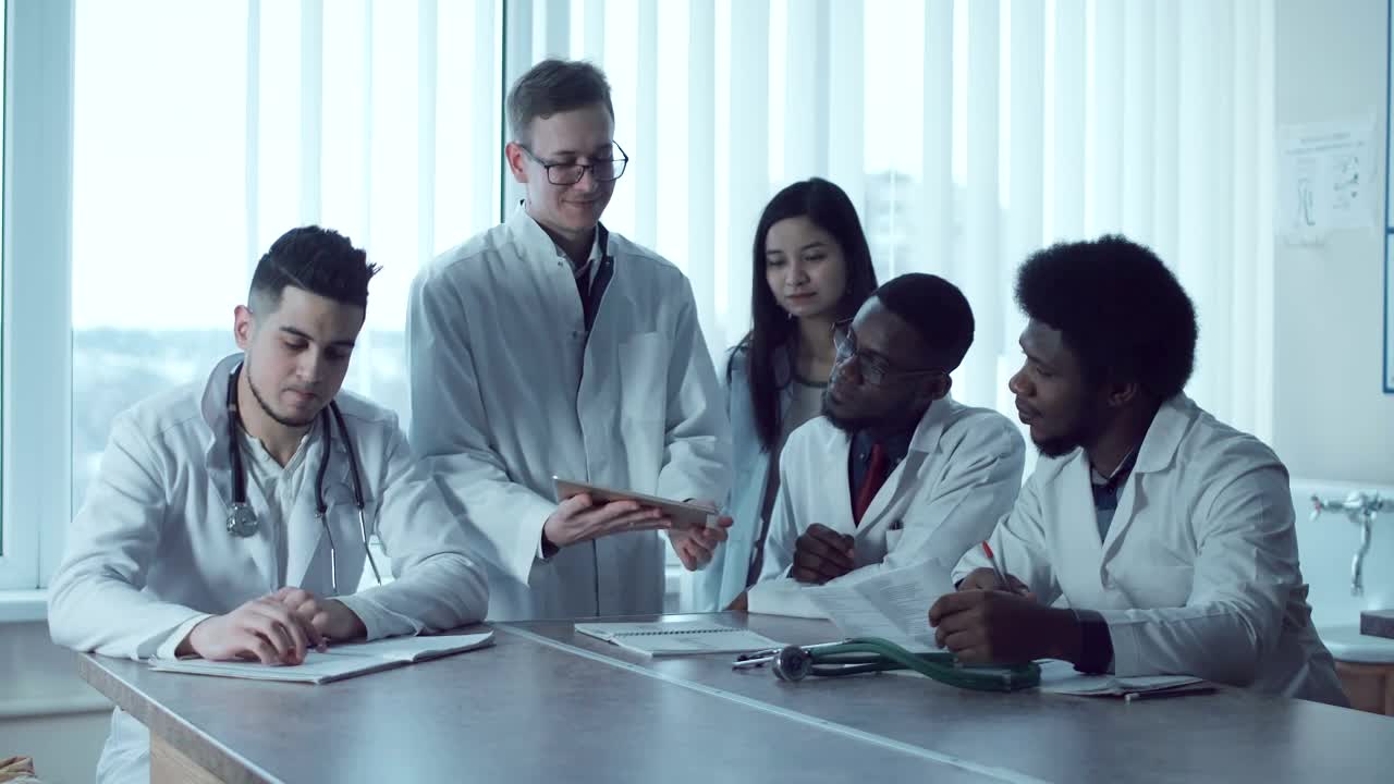 Stock Video Medical Students Sharing Note Animated Wallpaper