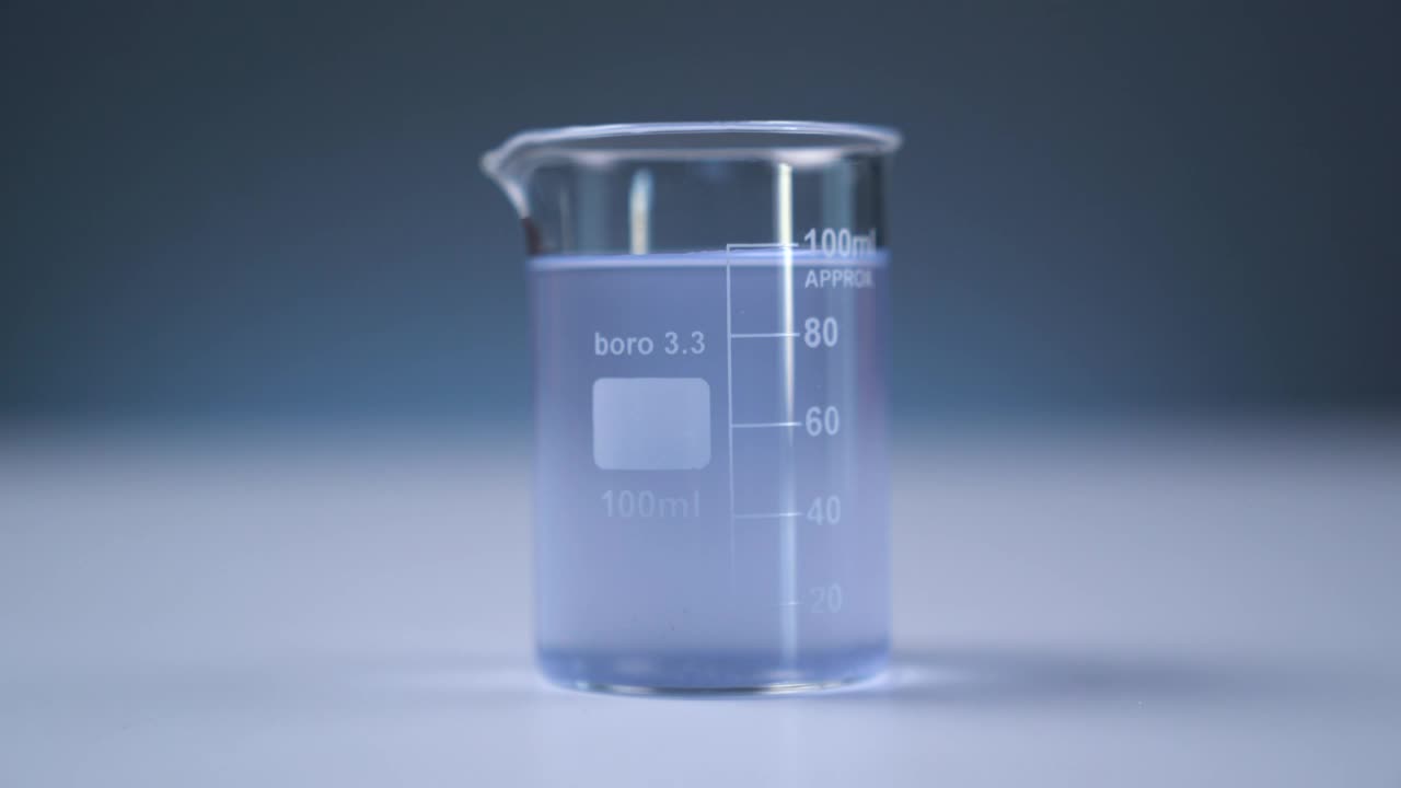 Stock Video Measurement Flask On The Tabl Animated Wallpaper