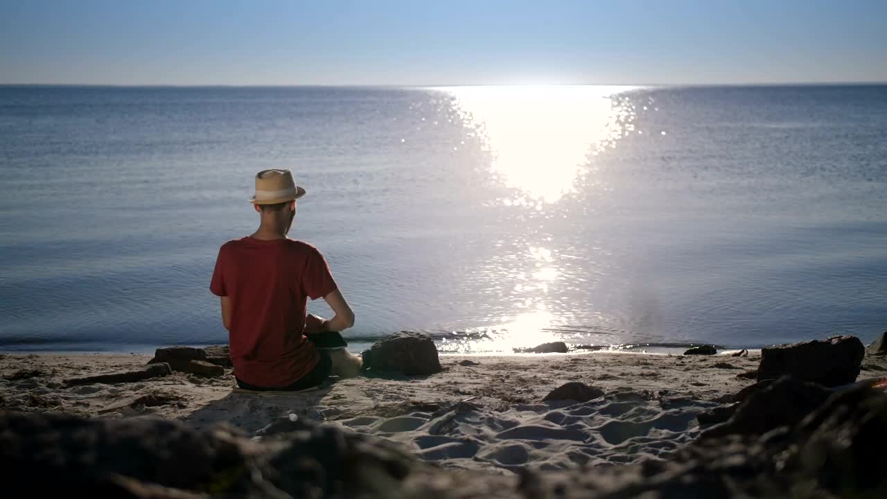 Stock Video Man Working Remotely From The Beac Animated Wallpaper