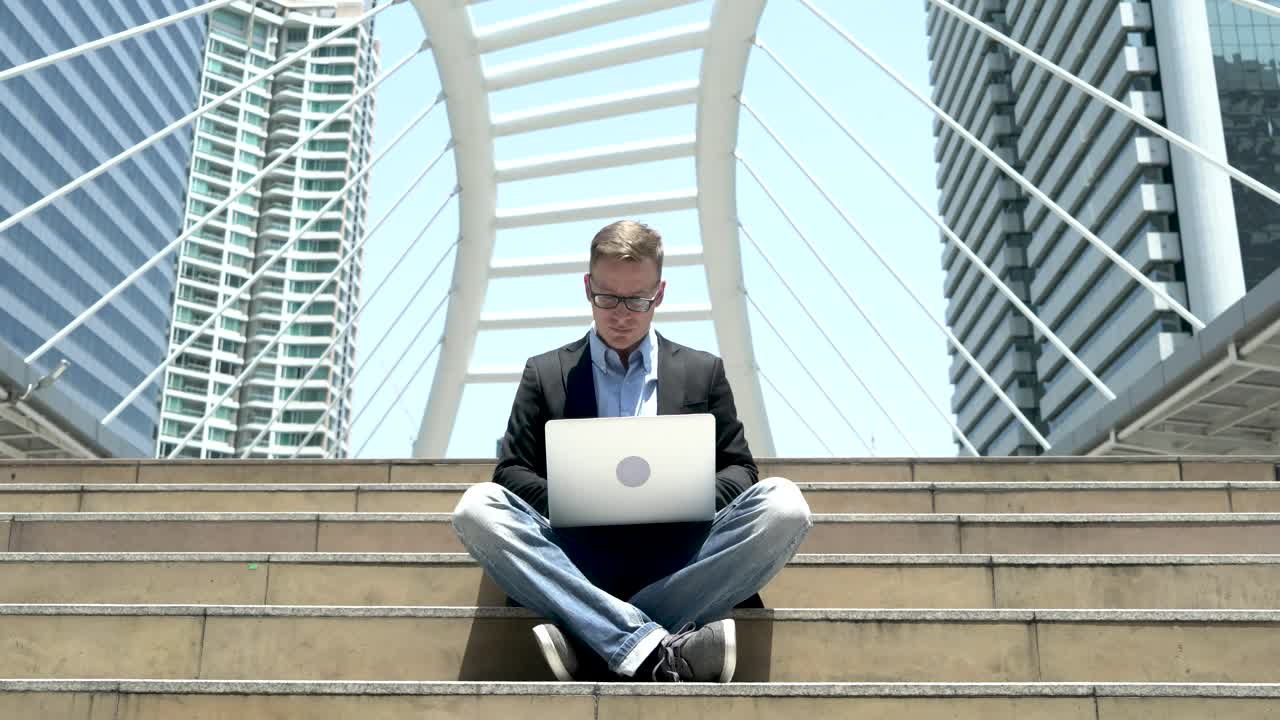 Stock Video Man Working On A Computer In The Stree Animated Wallpaper