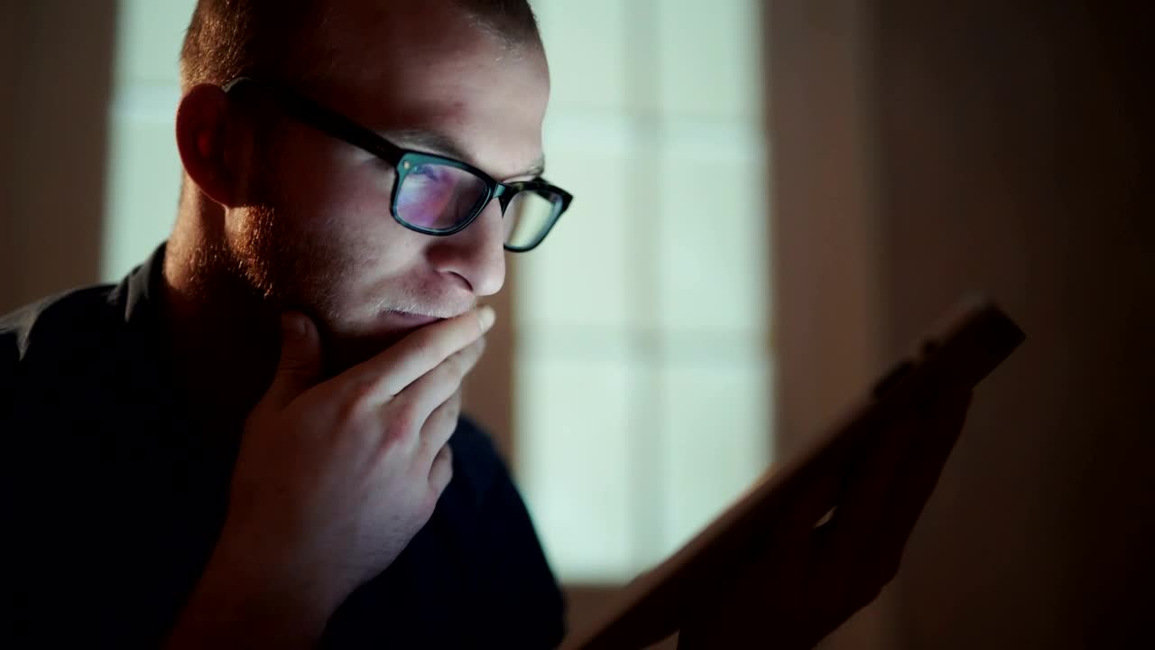 Stock Video Man With Insomnia Scrolls Through Table Animated Wallpaper
