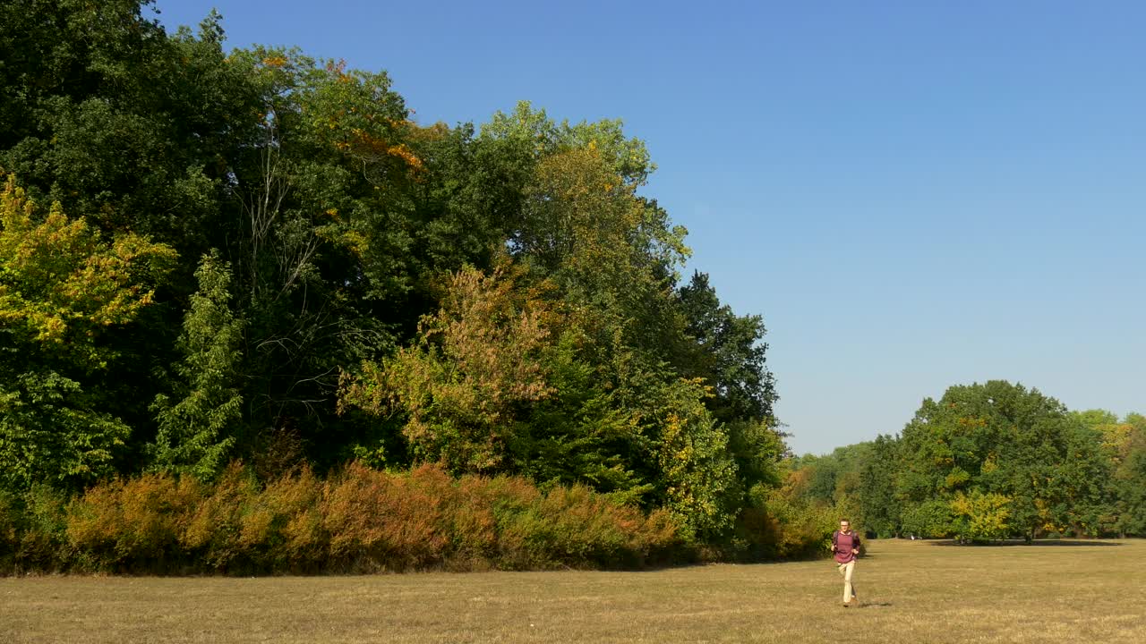 Stock Video Man With A Backpack Running On The Countrysid Animated Wallpaper