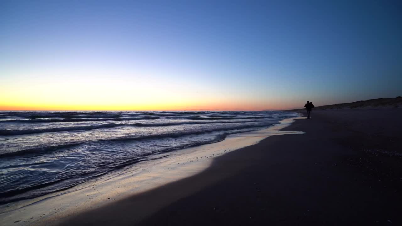 Stock Video Man Walking On The Beach With A Backpac Animated Wallpaper