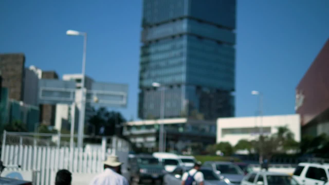 Stock Video Man Walking Among Traffic In The Cit Animated Wallpaper