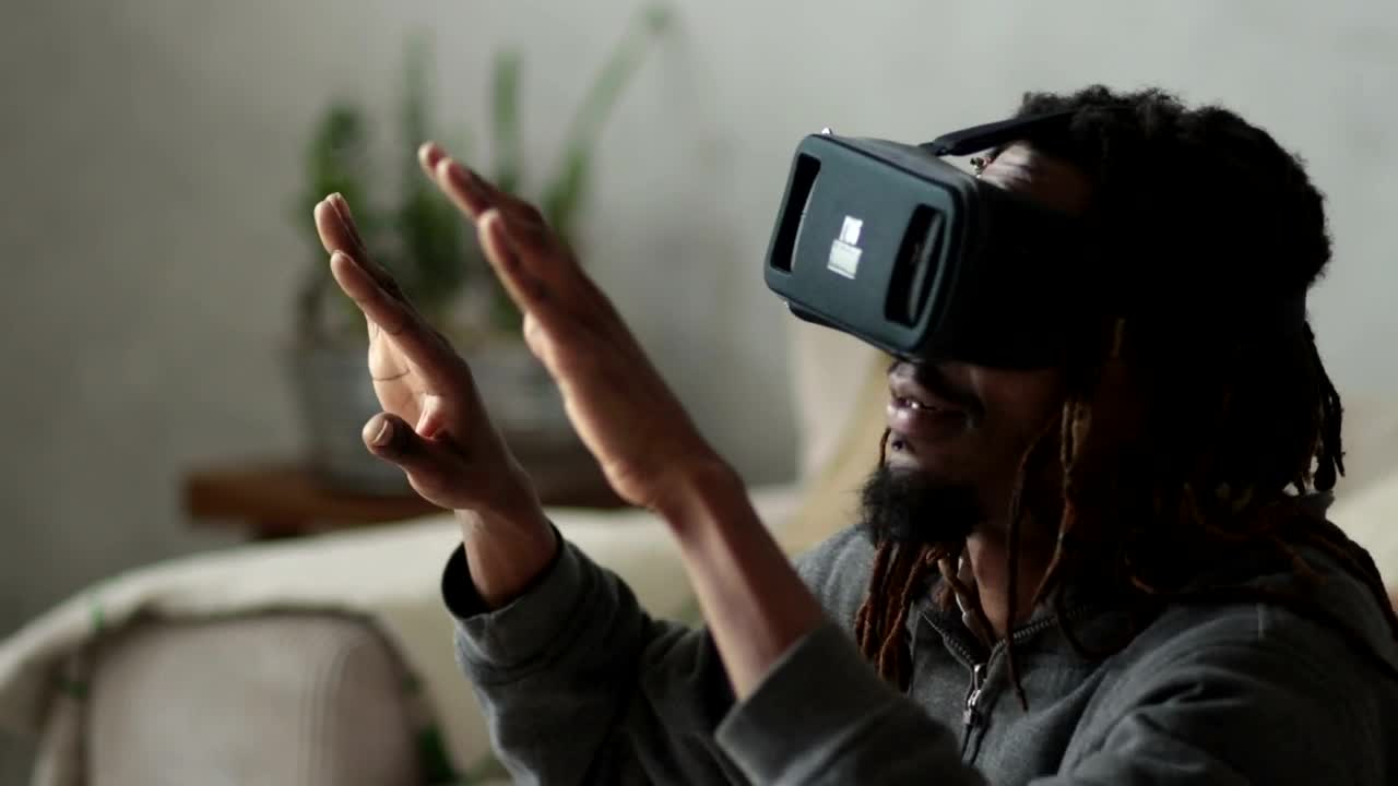 Stock Video Man Using A Vr Headse Animated Wallpaper