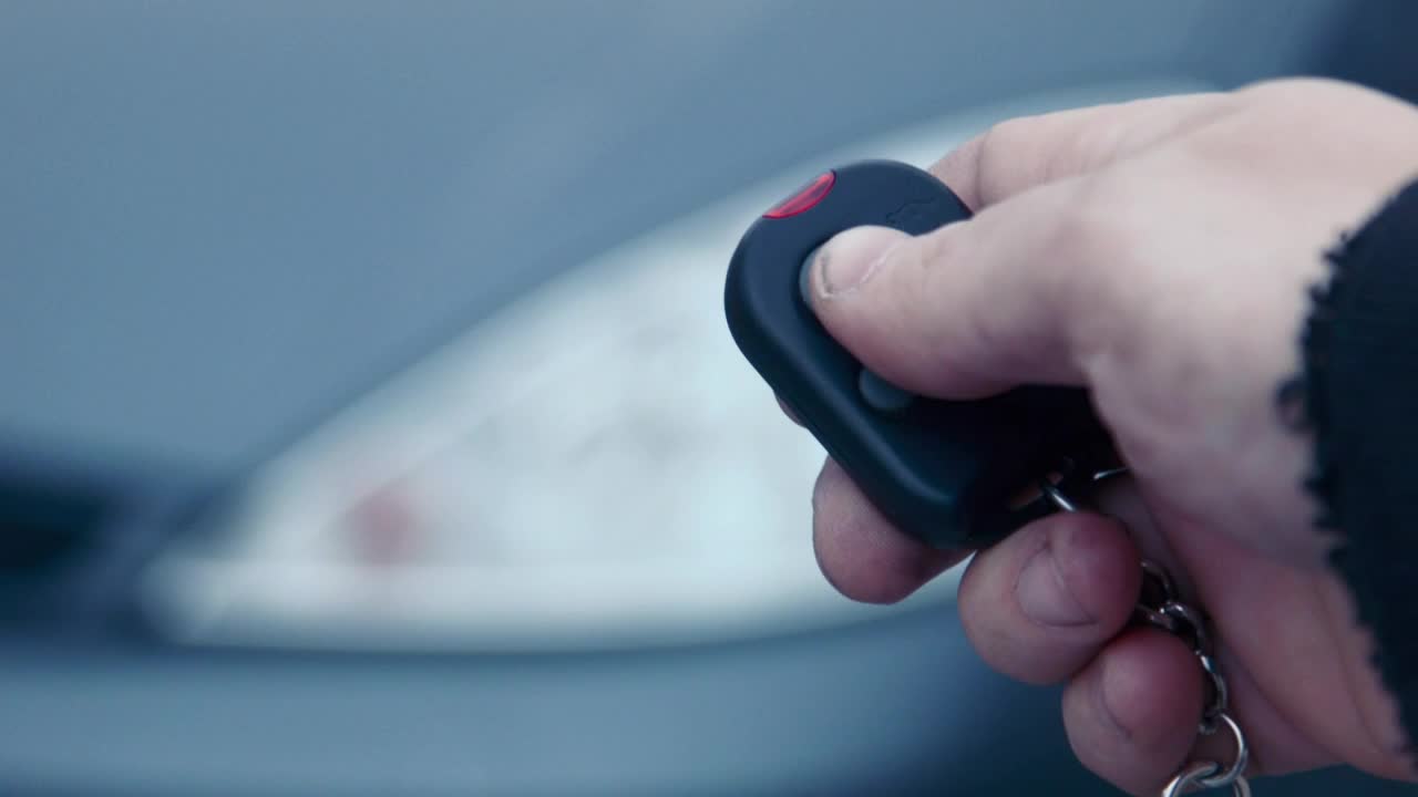 Stock Video Man Turning On The Alarm Of A Ca Animated Wallpaper