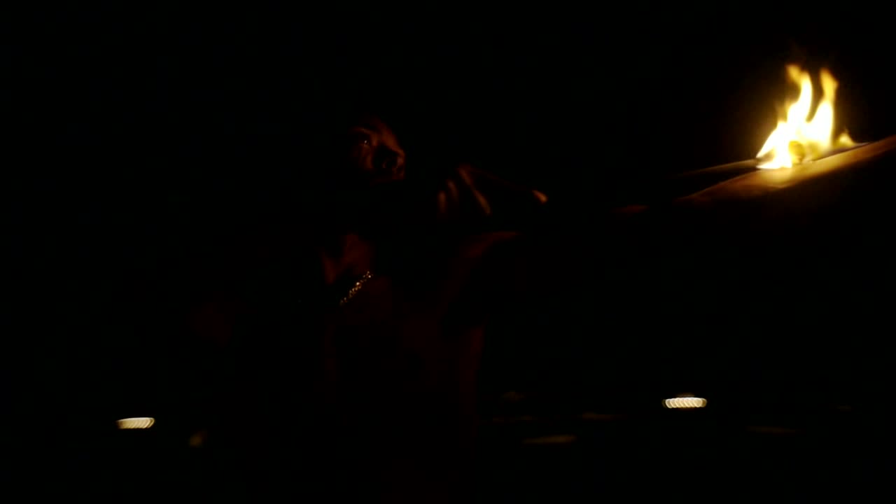 Stock Video Man Performing With Fir Animated Wallpaper