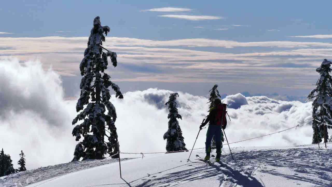Stock Video Near The Limit At The Top Of A Snowy Mountain Live Wallpaper