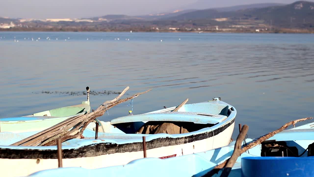 Stock Video Old Boats On The Shore Of A Large Lake LargeLive Wallpaper