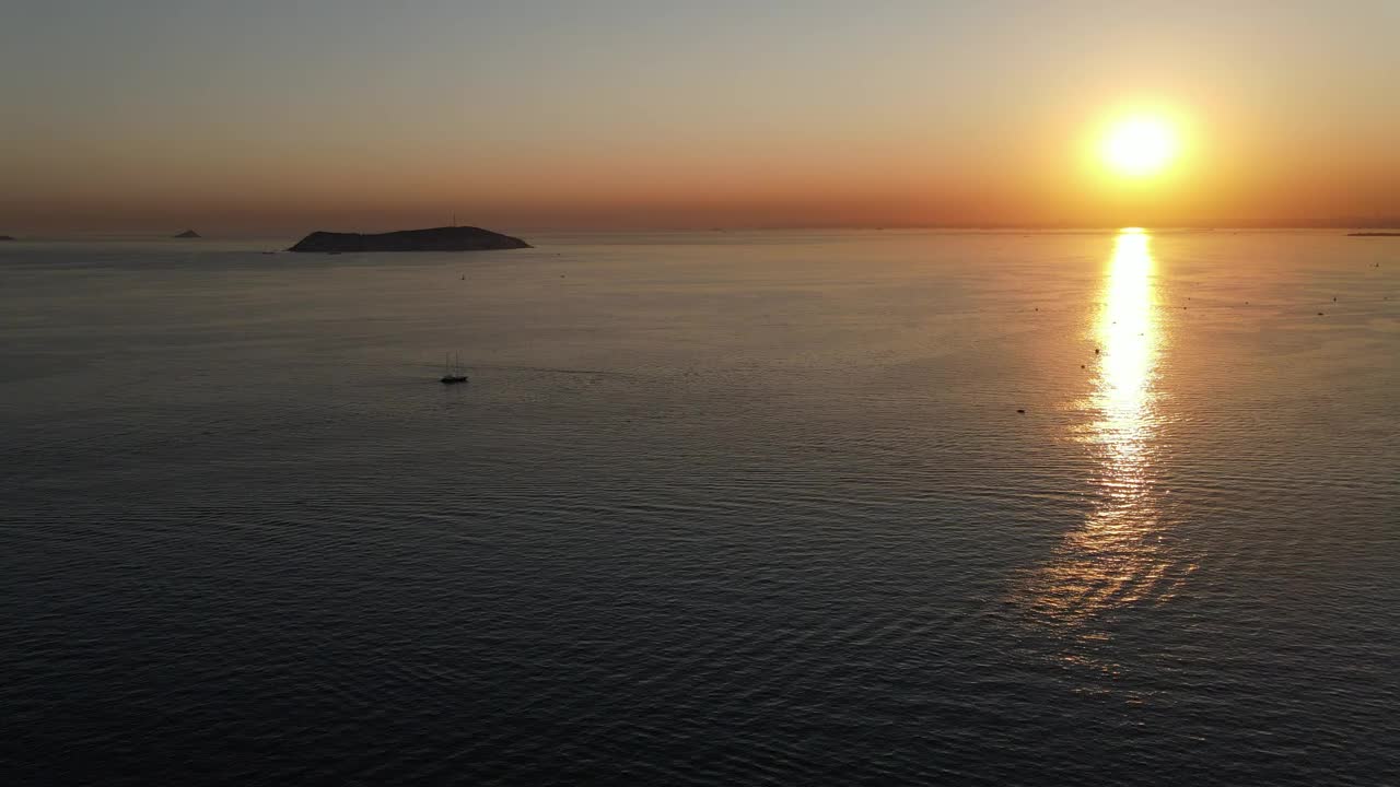 Stock Video Open Sea With A Small Boat In The Sunset Live Wallpaper