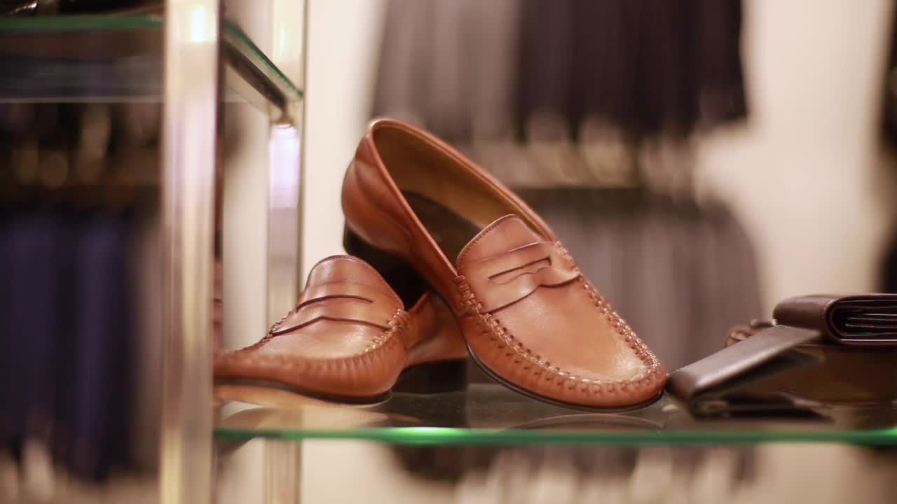 Stock Video Pair Of Shoes On A Sideboard Are Taken By A Live Wallpaper