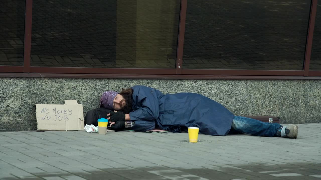 Stock Video Passerby Giving Money To Homeless Live Wallpaper