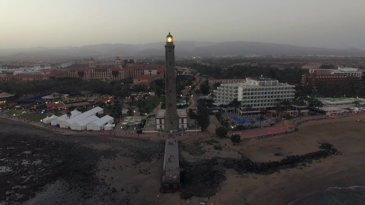 Stock Video People Around The Base Of A Lighthouse Live Wallpaper