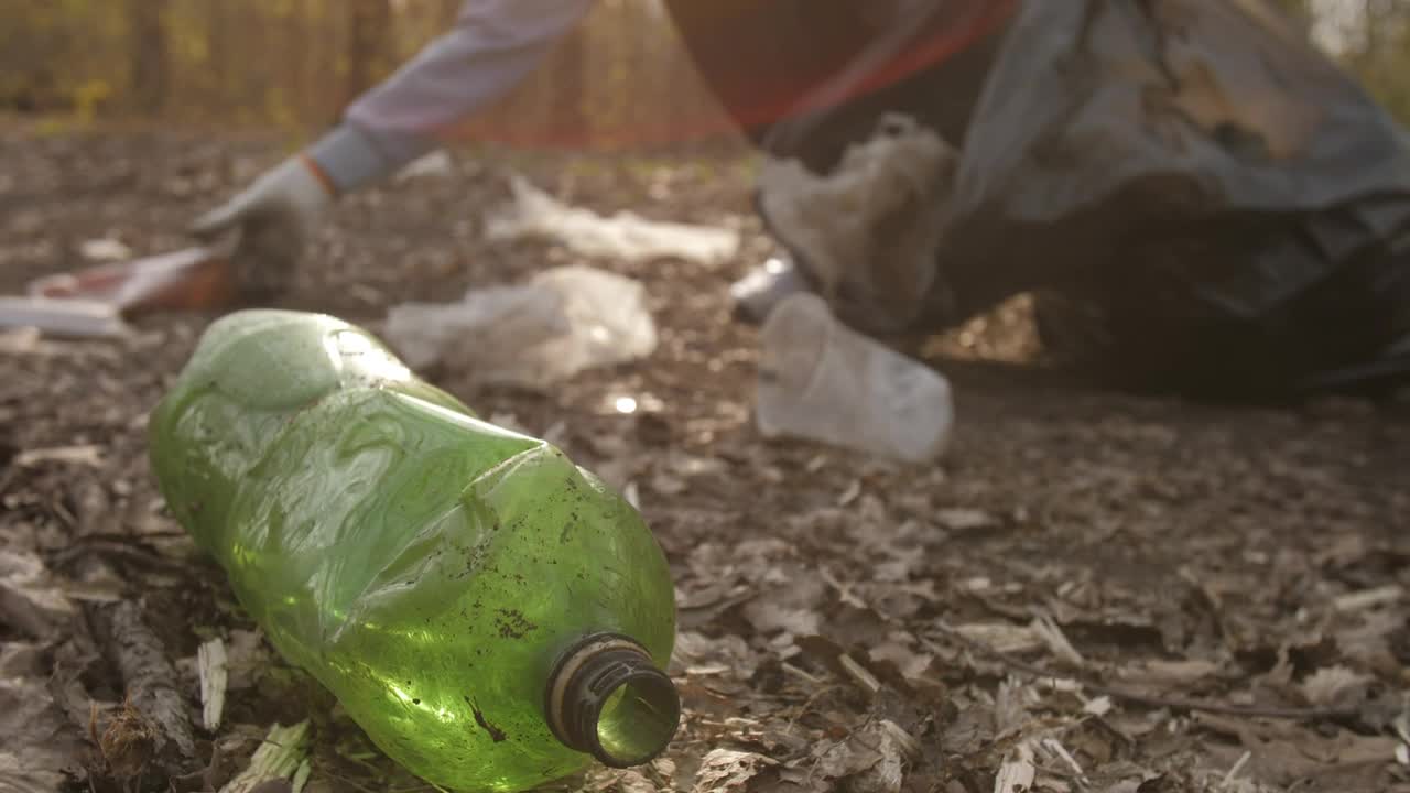 Stock Video Person Cleaning Garbage In Nature Live Wallpaper