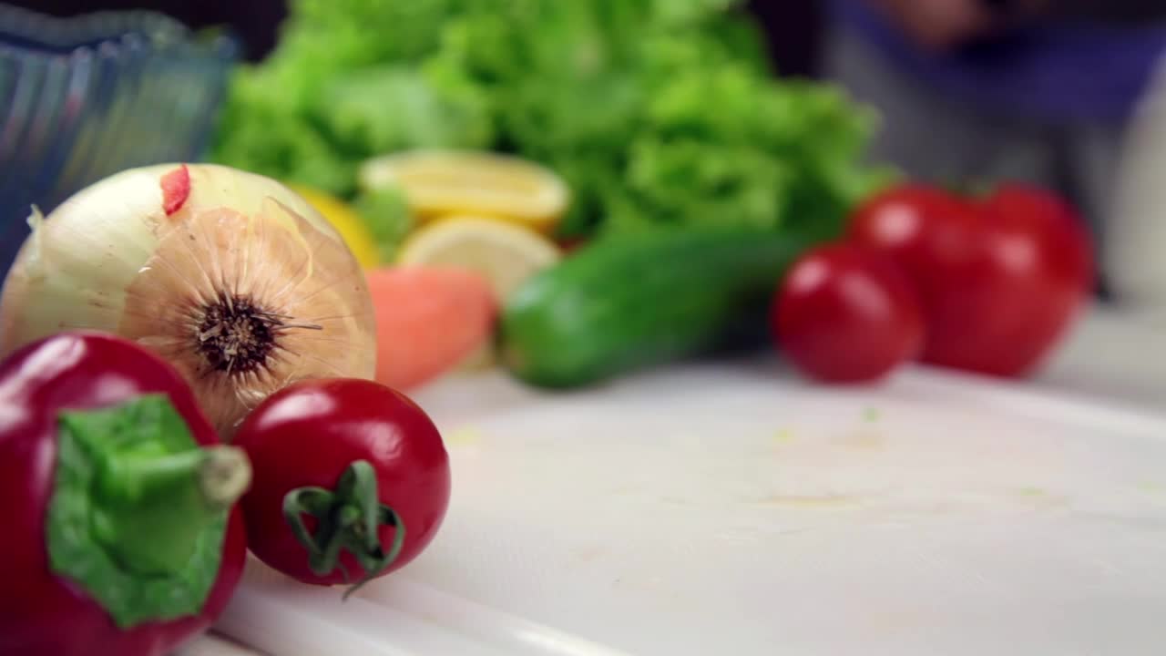 Video Stock Person Slicing Cheese At A Table With Vegetables Live Wallpaper Free